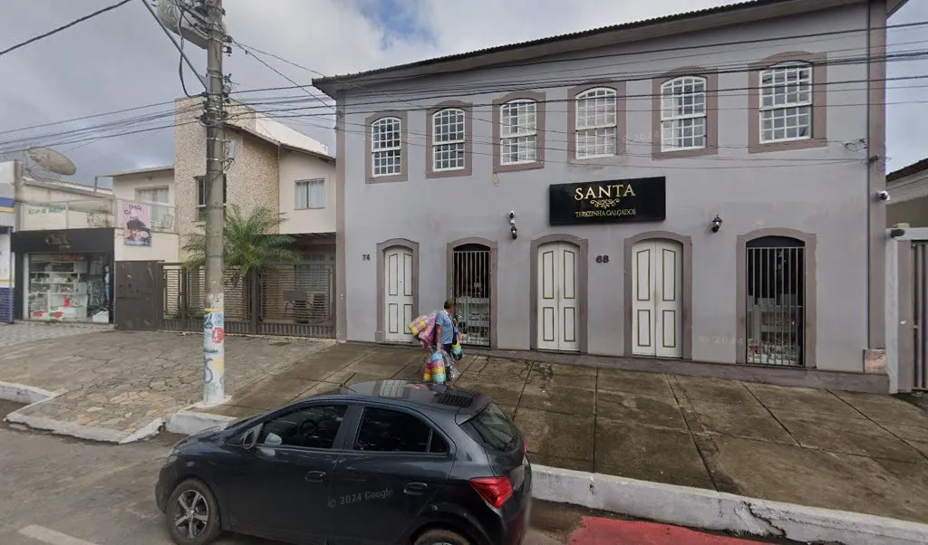 Atendimento de Qualidade — Santa Teresinha Calçados — Shoe store in Bom Sucesso, Minas Gerais