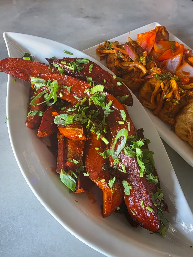 Sadeko momos — MoMo Spicy & Restaurant — Restaurant in Doha