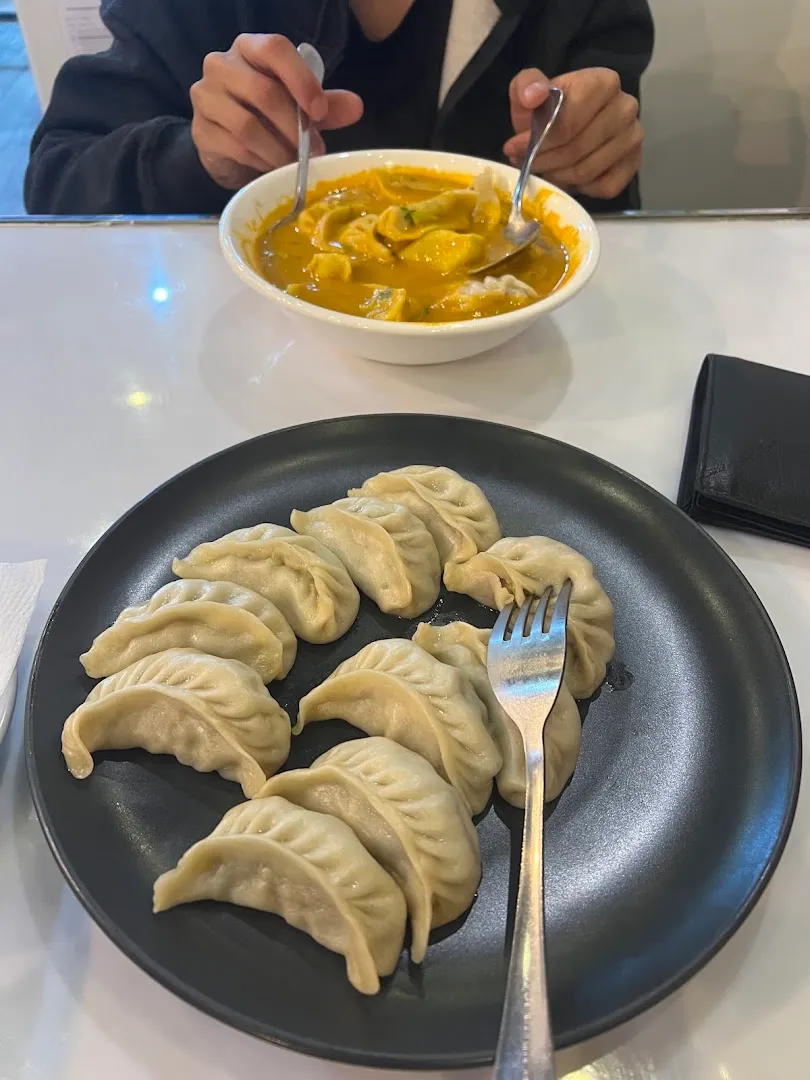 Mutton Dal Bhat Thali — MoMo Spicy & Restaurant — Restaurant in Doha