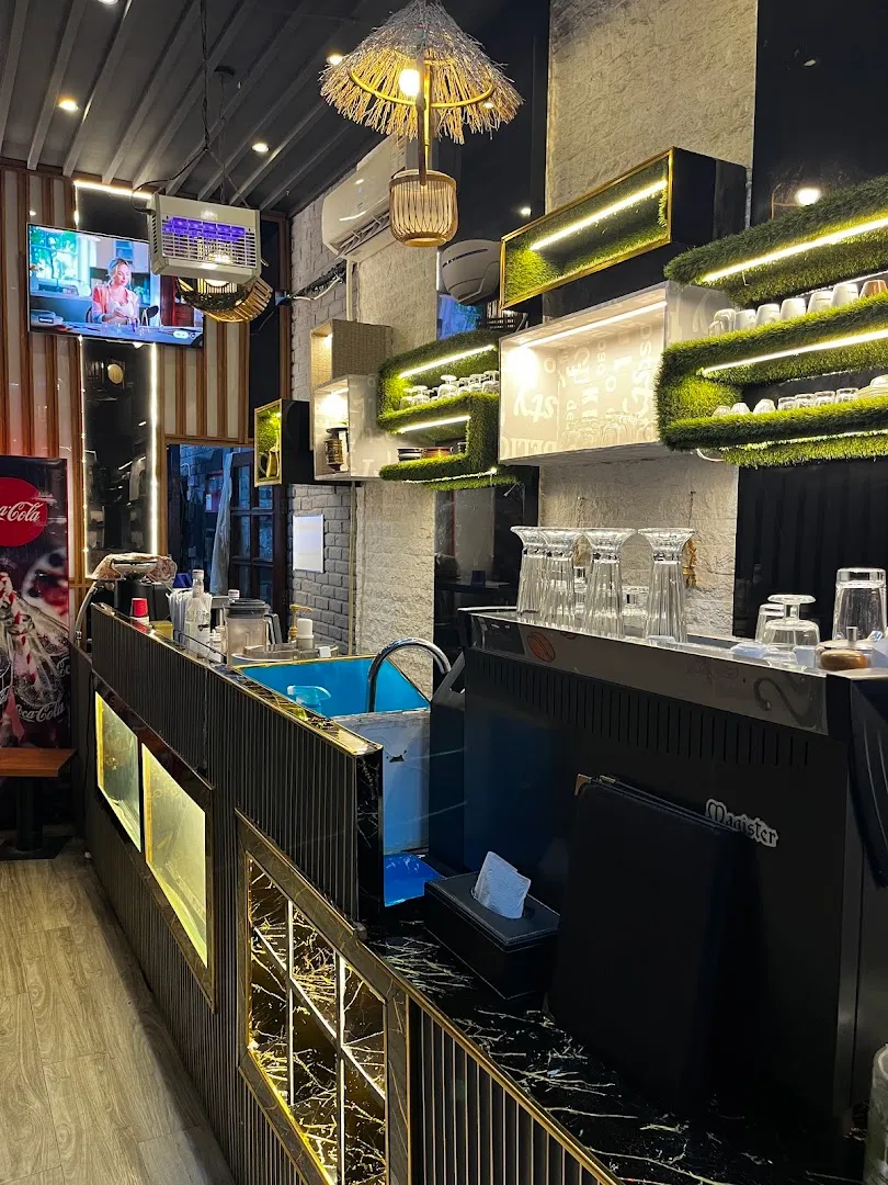 Jhol momo — MoMo Spicy & Restaurant — Restaurant in Doha
